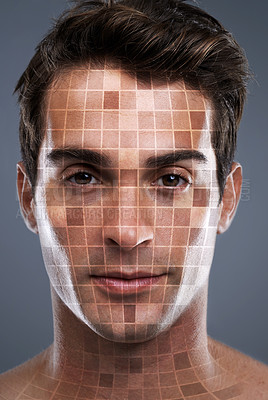 Buy stock photo Closeup studio portrait of a handsome young man with his face in mosaic