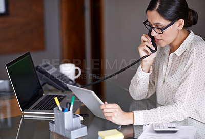 Buy stock photo Telephone, tablet and businesswoman on a call in the office doing research on the internet. Technology, landline and professional female employee working on corporate project with mobile in workplace