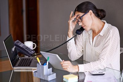 Buy stock photo Businesswoman, phone call and stressed in office, desk and on landline with client. Technology, computer and tablet touch screen for financial advisor, conversation and communication on budget