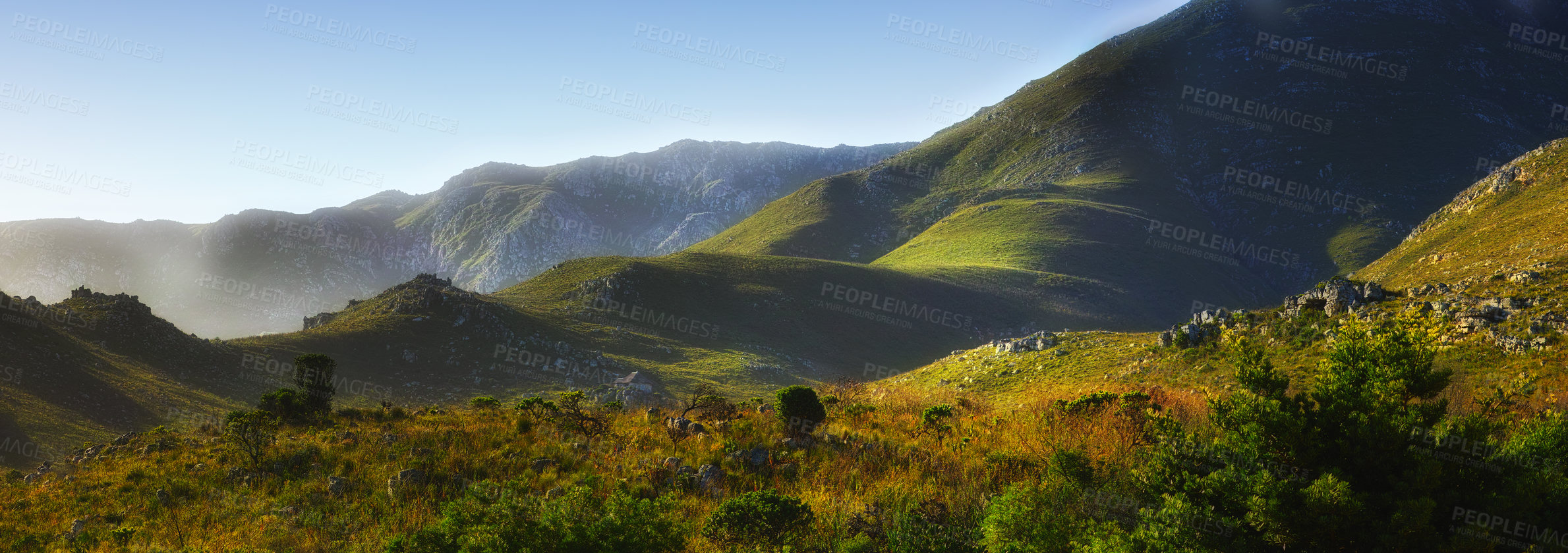 Buy stock photo Mountain, fog and natural hill with field, blue sky and calm landscape for travel location. Nature, green and sustainable environment with earth, peace and holiday destination with conservation