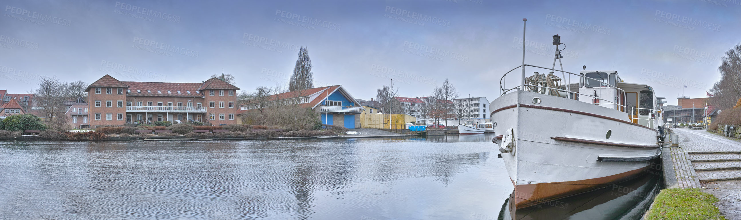 Buy stock photo Harbor, ship and town in nature outdoors, travel and yacht on holiday or vacation or location. City, seaside and boat on water for peace or calm in Silkeborg, Denmark and river or lake on getaway