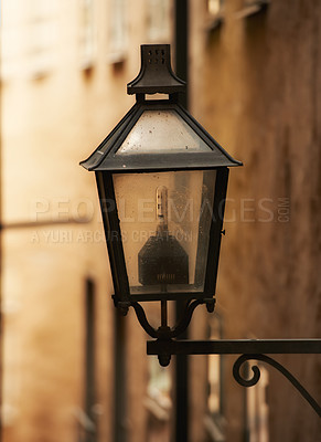 Buy stock photo Travel, architecture and lamp on retro building in old town with history, culture or holiday destination in Sweden. Vacation, landmark and antique lantern in Stockholm with vintage light ancient city