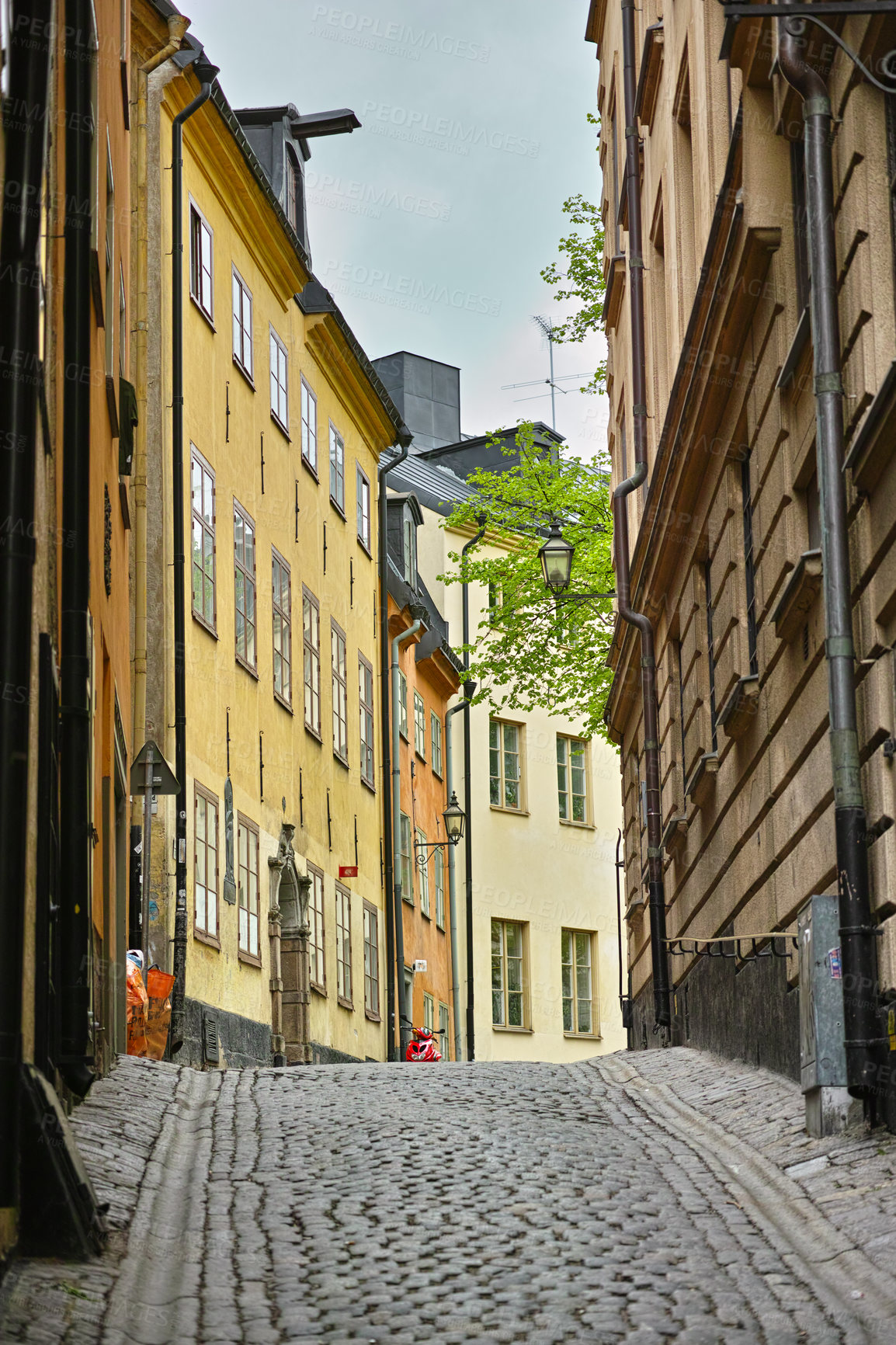 Buy stock photo Travel, architecture and road in vintage alley with history, culture or holiday destination in Sweden. Vacation, old buildings and antique stone street in Stockholm with cobble path in ancient city