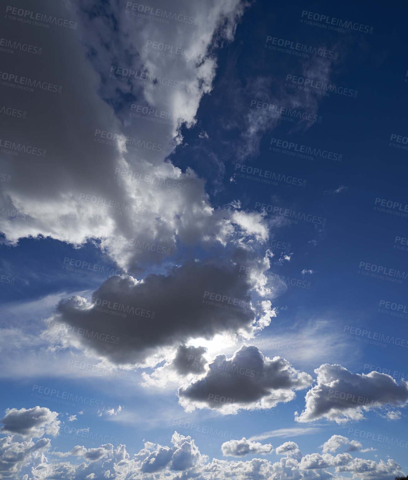 Buy stock photo Beautiful cloudscape with sunbeams breaking through