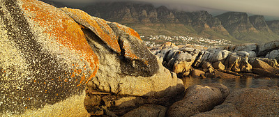 Buy stock photo Rocks, beach and natural landscape with travel, environment and holiday destination in Cape Town. Nature, banner and sea view by outdoor scenery for journey, tropical adventure and summer vacation.