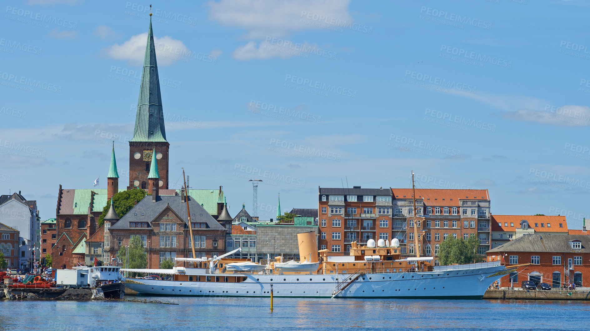Buy stock photo Harbor, ship and city in nature outdoors, travel and yacht on holiday or vacation or location. Urban, historic building and boat on water for peace or calm in Aarhaus, Denmark and river on getaway
