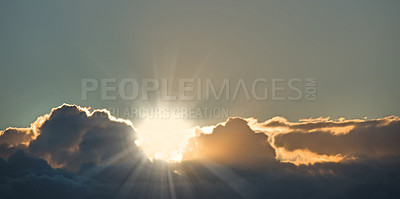 Buy stock photo Sunshine breaking through dark clouds on the horizon