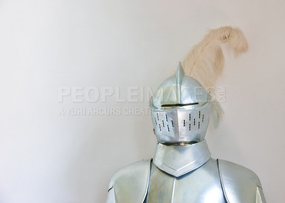Buy stock photo Knight, medieval suit and armor with mockup space of soldier, statue or honor on a gray studio background. Helmet, gear or equipment for battle, war or security in justice, shining silver or visor