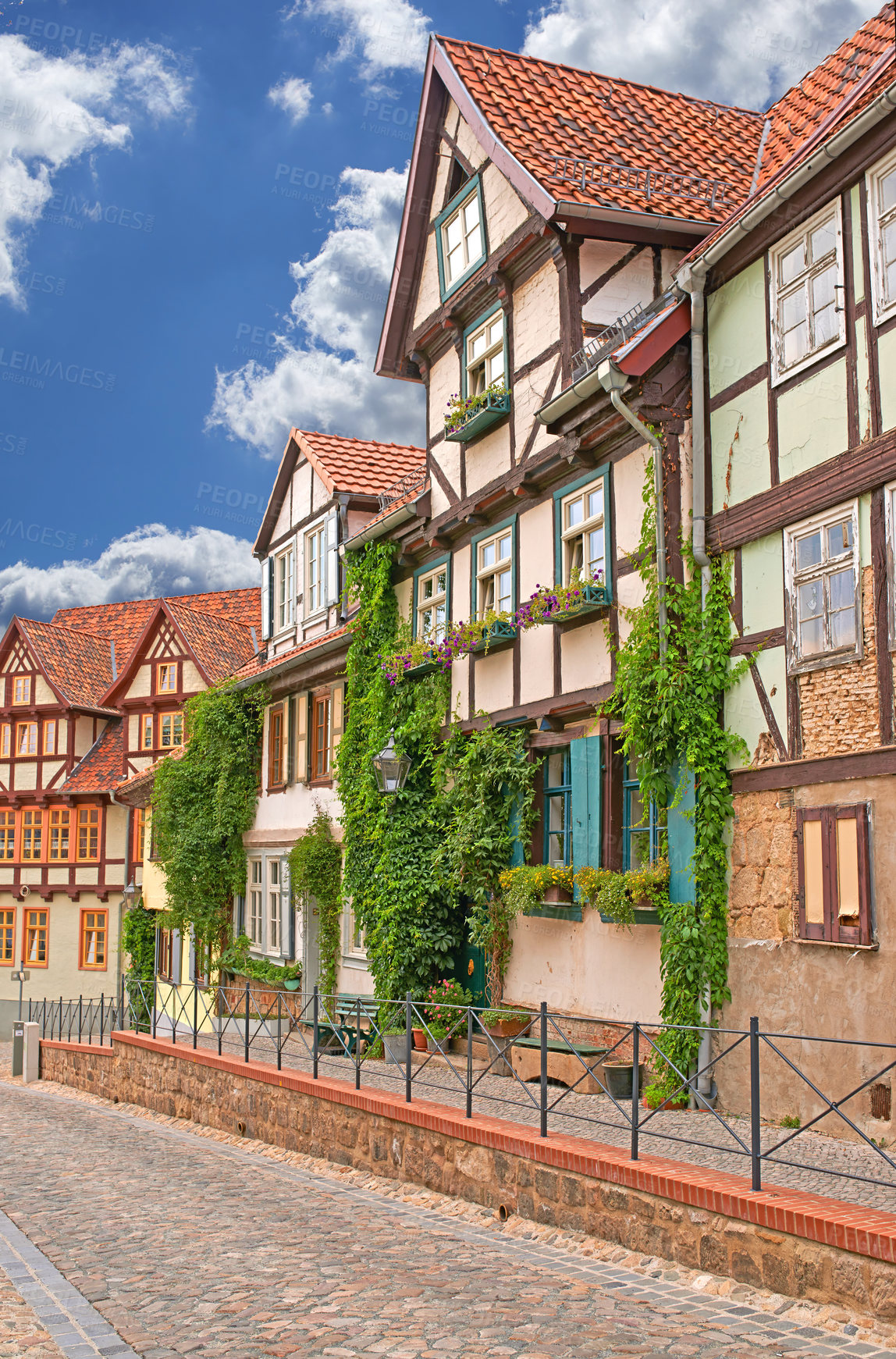 Buy stock photo Village, buildings and facade with heritage, architecture in traditional, culture and retro as tourist attraction in Germany. House, vintage and street in countryside, neighborhood or community