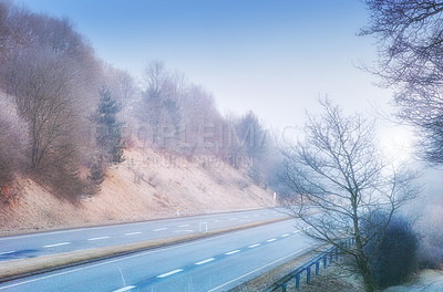 Buy stock photo Highway, road trip and natural landscape for travel, holiday and winter trees in countryside. Nature, forest and street for journey, vacation or outdoor adventure with peace, relax and wilderness.