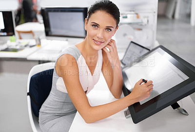 Buy stock photo A young woman working on a digital touchscreen