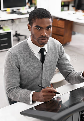 Buy stock photo A young man working on a large touchscreen