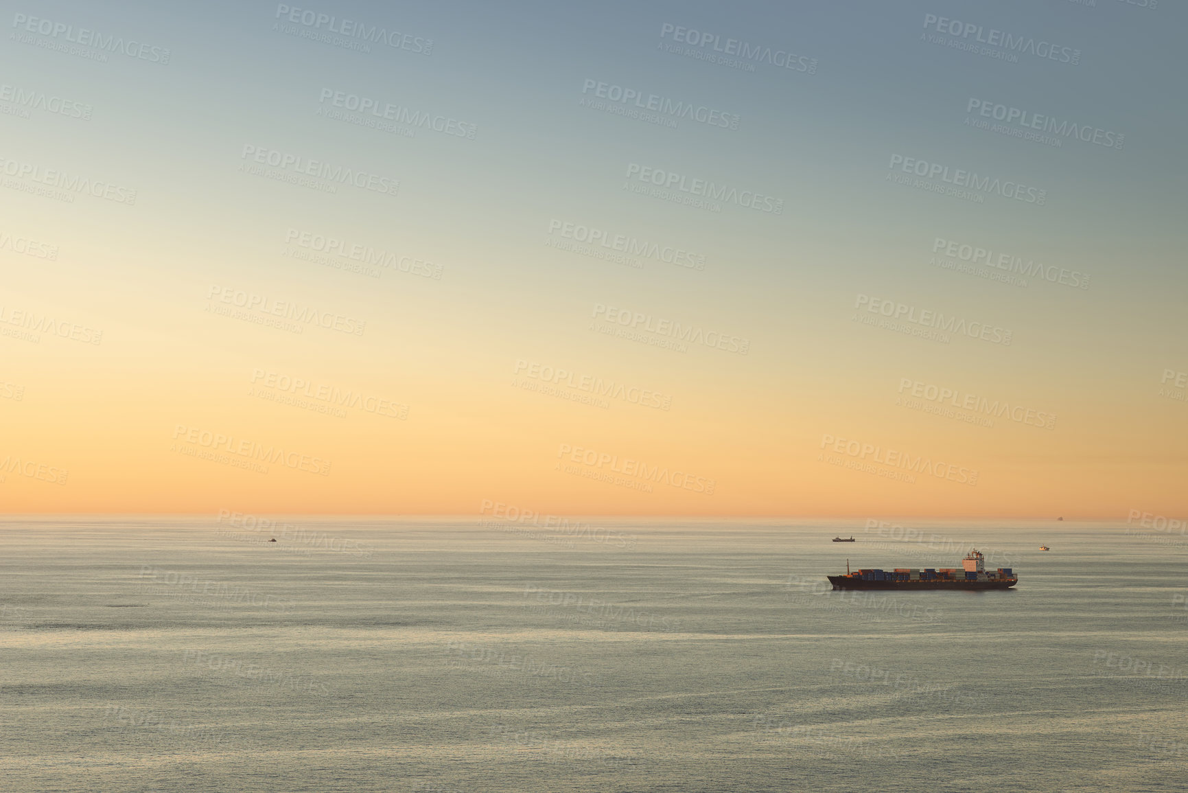 Buy stock photo A ship on the horizon on a calm ocean