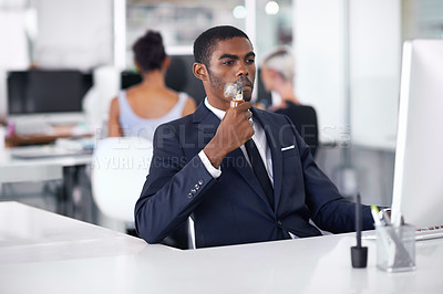 Buy stock photo Black man, smoking and vaping in office or business with cigarette, electronic pipe in formal clothes. Businessman, corporate and working on computer, technology or connect and salesman in workplace