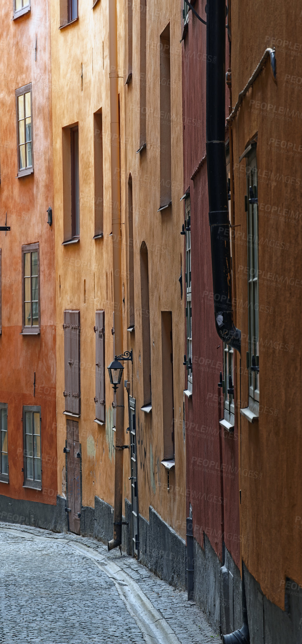 Buy stock photo Travel, architecture and street with vintage buildings in old town with history, culture or holiday destination in Sweden. Vacation, alley and antique road in Stockholm with apartment in ancient city