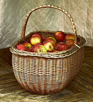 Buy stock photo Closeup, apple and basket for autumn, still life and artwork of healthy, food or agriculture. Organic, fruit and floor for ecosystem, sustainability or zero waste for natural eco friendly snack