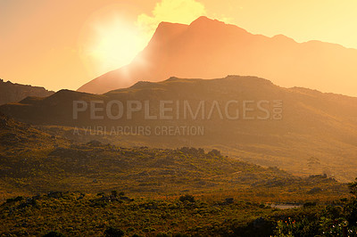 Buy stock photo A misty sunrise over a South African landscape