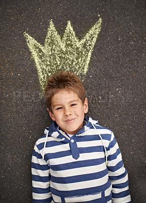 Buy stock photo Chalk art, portrait and boy with crown on floor for drawing, imagine or future fantasy on black background. King, face or boy with sketch of royalty, prince or dream for school, project or assignment