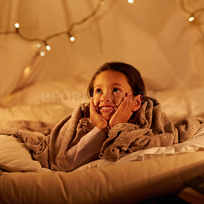 Buy stock photo Thinking, happy and girl in a bedroom fort in a house for holiday, games or staycation fun. Face, smile and dreaming kid in diy tent for playing, resting or enjoy weekend with camping fantasy at home