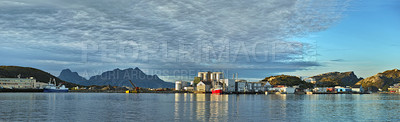 Buy stock photo A dock in Norway seen from across the tranquil water
