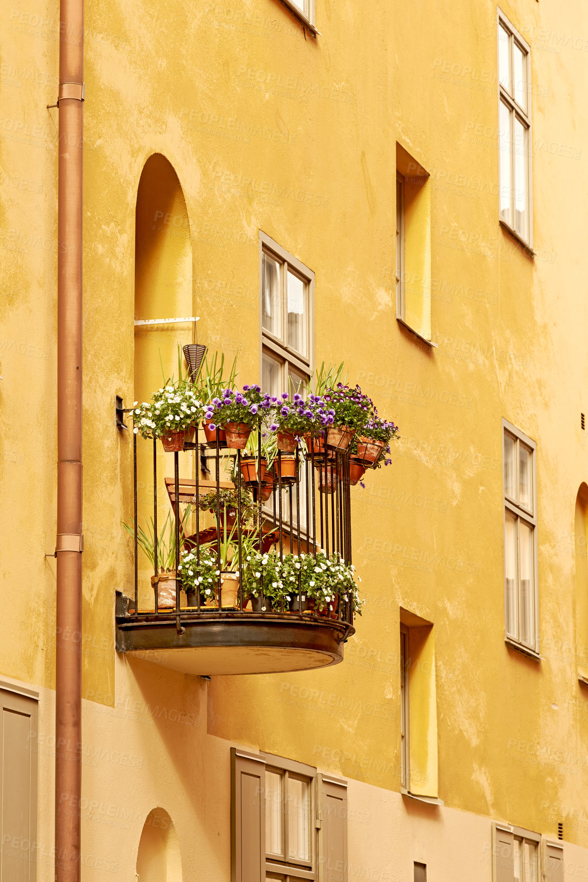Buy stock photo A small flower-decorated balcony on an old building in Old town, Stockholm