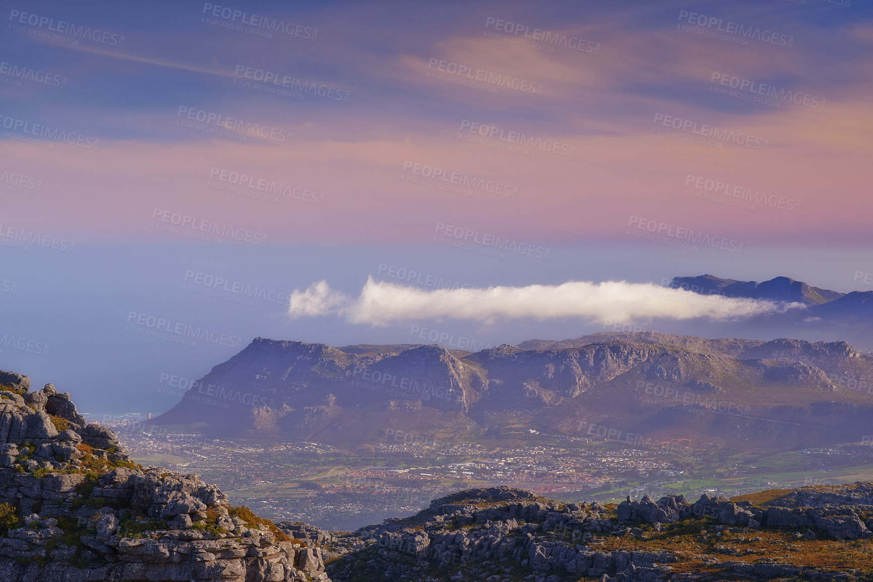 Buy stock photo Mountains, color and natural landscape with cloudy sky, sunset and calm cliff at travel location. Nature, island and sustainable environment with earth, peace and pink tropical holiday destination