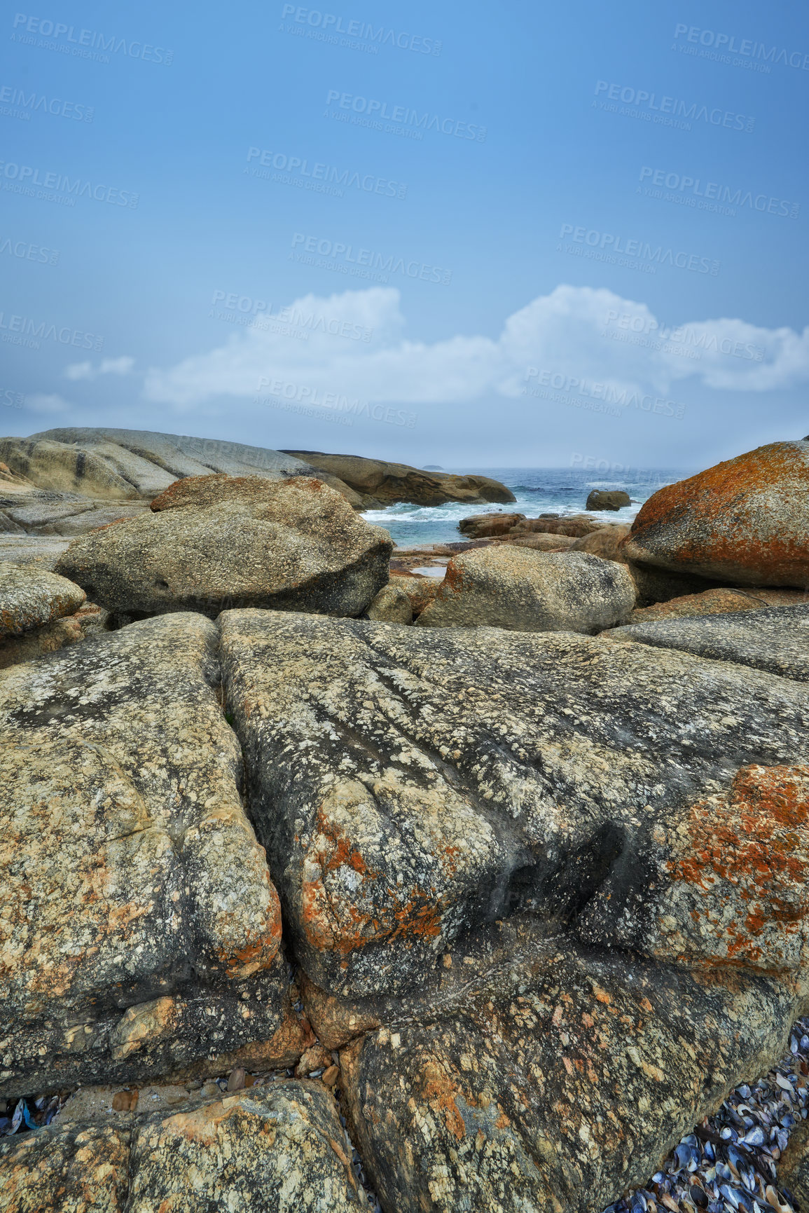 Buy stock photo Nature, blue sky and rocks by ocean in summer for travel destination, holiday and vacation. Natural background, landscape and waves, sea and water for scenic view in environment, ecosystem and island