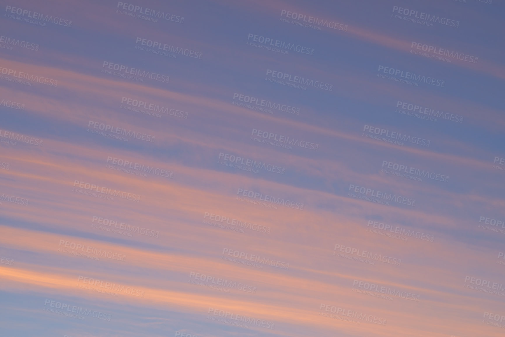 Buy stock photo View of clouds streaked across the sky at sunset with copyspace. Soft pastel lines of colour in nature, blue sky in the late afternoon. Zen, open clear sky offering a calm, gentle reminder to breathe