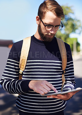 Buy stock photo Man, tablet and scroll online while outdoor, taxi service app or rideshare for travel and connection in street. Touchscreen, tech and social media, digital map for location and navigation on journey