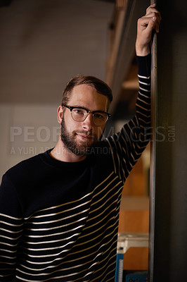 Buy stock photo Man, portrait and confident in home for satisfaction, smile and pride for comfort or enjoyment in living room. Male person, glasses and happy with eyewear for wellness, lounge and face in apartment