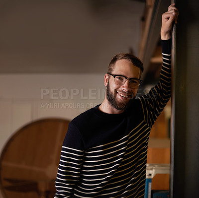 Buy stock photo Man, portrait and confident in home to relax, smile and pride for comfort or enjoyment in living room. Male person, glasses and happy with eyewear for wellness, satisfaction and face in apartment