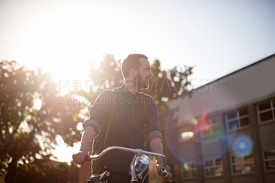 Buy stock photo Bicycle, travel and man with lens flare happy for exercise, commute and cycling in morning. Transport, city and male cyclist with bike for eco friendly traveling, carbon footprint ride and journey