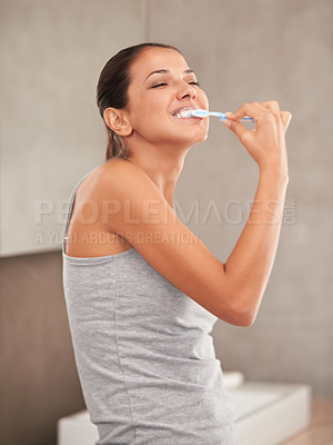 Buy stock photo Happy, bathroom and woman with toothbrush for cleaning, oral hygiene and dental care in home. Toothpaste, healthcare and person brushing teeth for whitening, wellness and grooming for gum disease