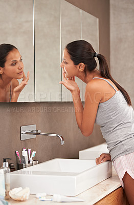 Buy stock photo Bathroom, face in mirror and woman for skincare, beauty and wellness in morning routine. Health, dermatology and person in reflection for pimple, home or facial for cleaning, hygiene and grooming