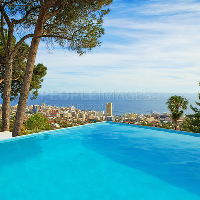 Buy stock photo Swimming pool, city and building or outdoor travel for destination in summer for hotel, infrastructure or downtown. Skyline, water and lodge accommodation in Cape Town for relax, trip or vacation