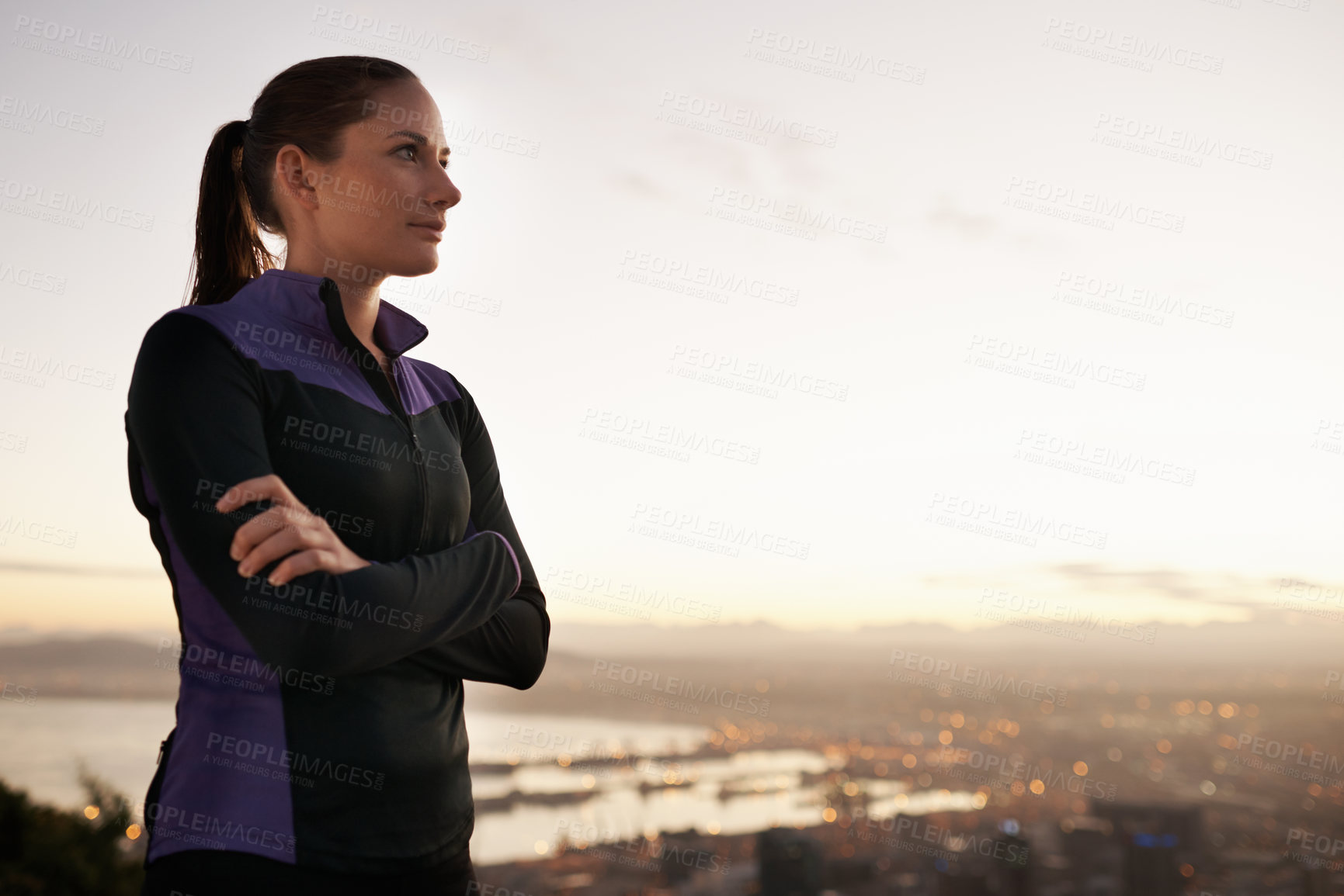 Buy stock photo Woman, thinking and fitness with sunset on mountain in city for workout or outdoor exercise in nature. Young female person or athlete with arms crossed in wonder or confidence for training on mockup
