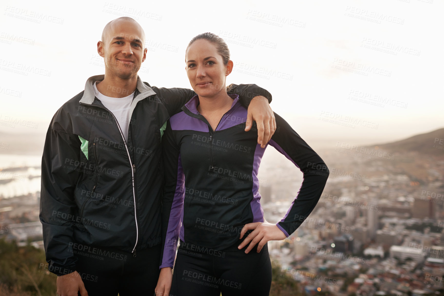 Buy stock photo Happy couple, portrait and fitness with hug on mountain for workout, exercise or training together. Man and woman with smile, love or support for hiking, running or health and wellness in nature