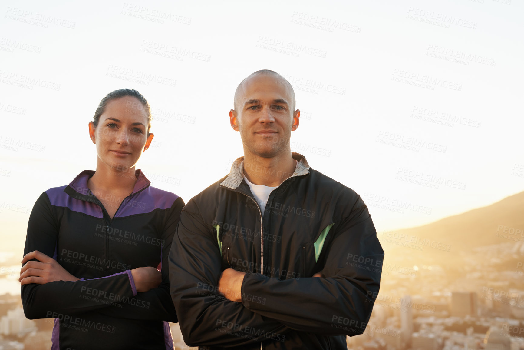Buy stock photo Happy couple, portrait and fitness with confidence on mountain for workout, training or outdoor exercise in nature. Young man and woman with smile and arms crossed in health and wellness together