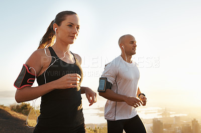Buy stock photo Wellness, fitness or people running and listening to music in morning workout or exercise for wellness. Sport, man and woman runner with athlete as training for marathon run, sports or energy radio