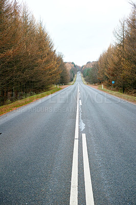 Buy stock photo Autumn, trees and sky by highway with overcast weather for journey, trip and travel on road in Germany. Nature, environment and street at countryside with direction, horizon and view of woods