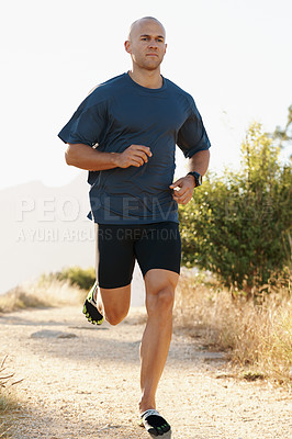 Buy stock photo Runner, man and marathon on trail with fitness for sport, training and exercise for competition on mountain. Athlete, person and running with wellness, challenge or cardio for healthy body in Denmark