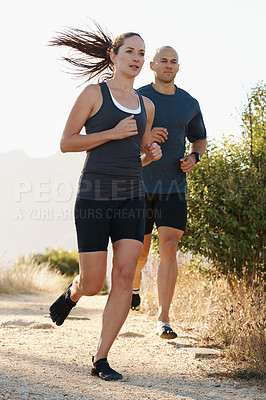 Buy stock photo Mountain, fitness and people trail running as workout or morning exercise for health and wellness together. Sport, man and woman runner run with athlete as training in nature for sports or energy