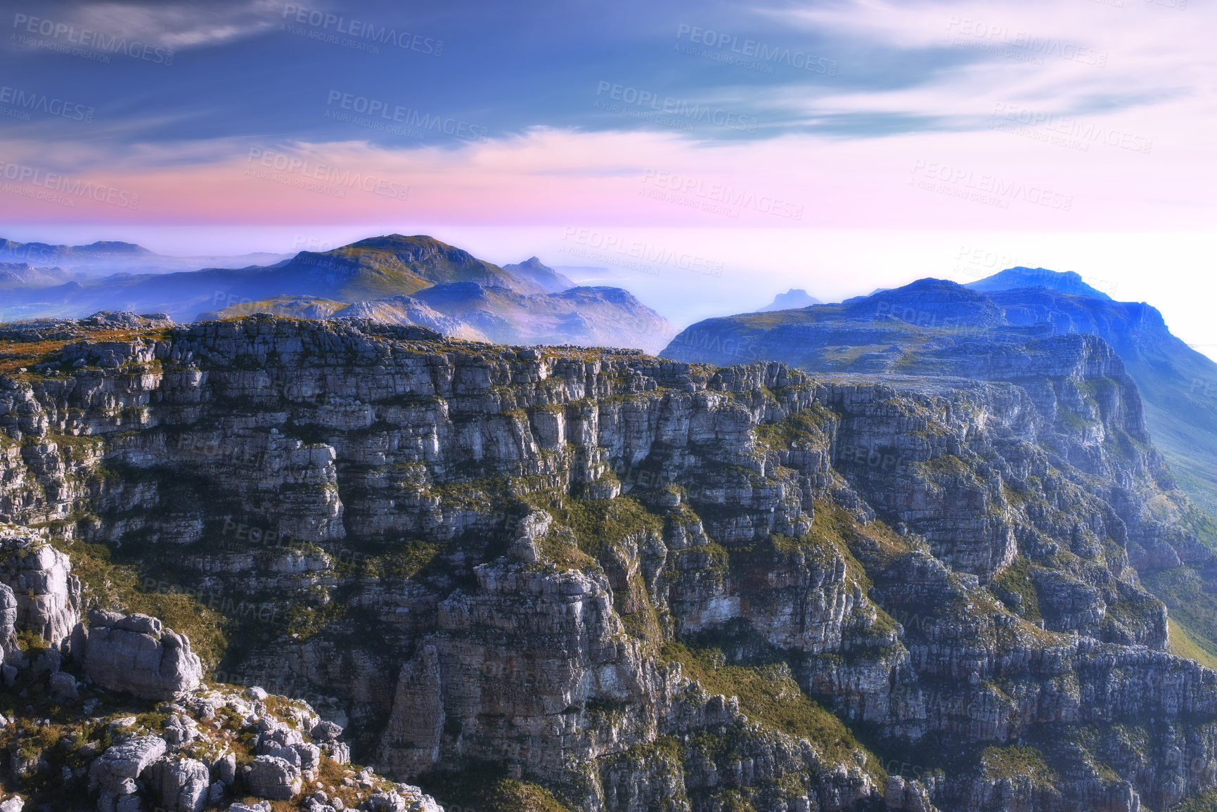 Buy stock photo Mountain, clouds and sunset sky with pink, natural landscape and calm cliff at travel location. Nature, color and sustainable environment with earth, peace and holiday destination at tropical island