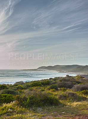 Buy stock photo A view over the ocean in Cape Province, South Africa. Beauty in nature with the seascape of the ocean. Sky with clouds over the ocean on a summer's day. Calm and serene nature scene with waves 