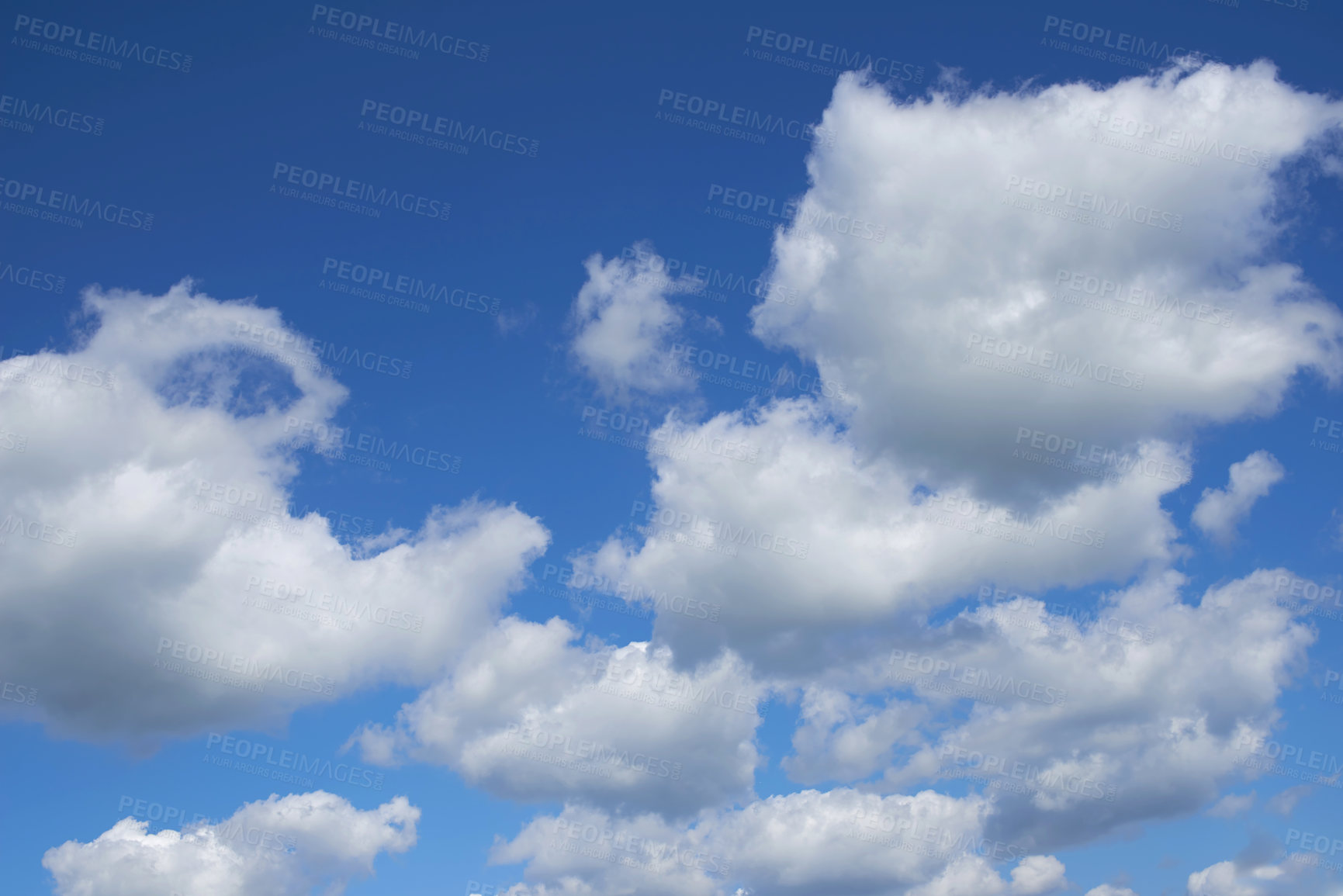 Buy stock photo White cumulonimbus clouds floating in the blue sky