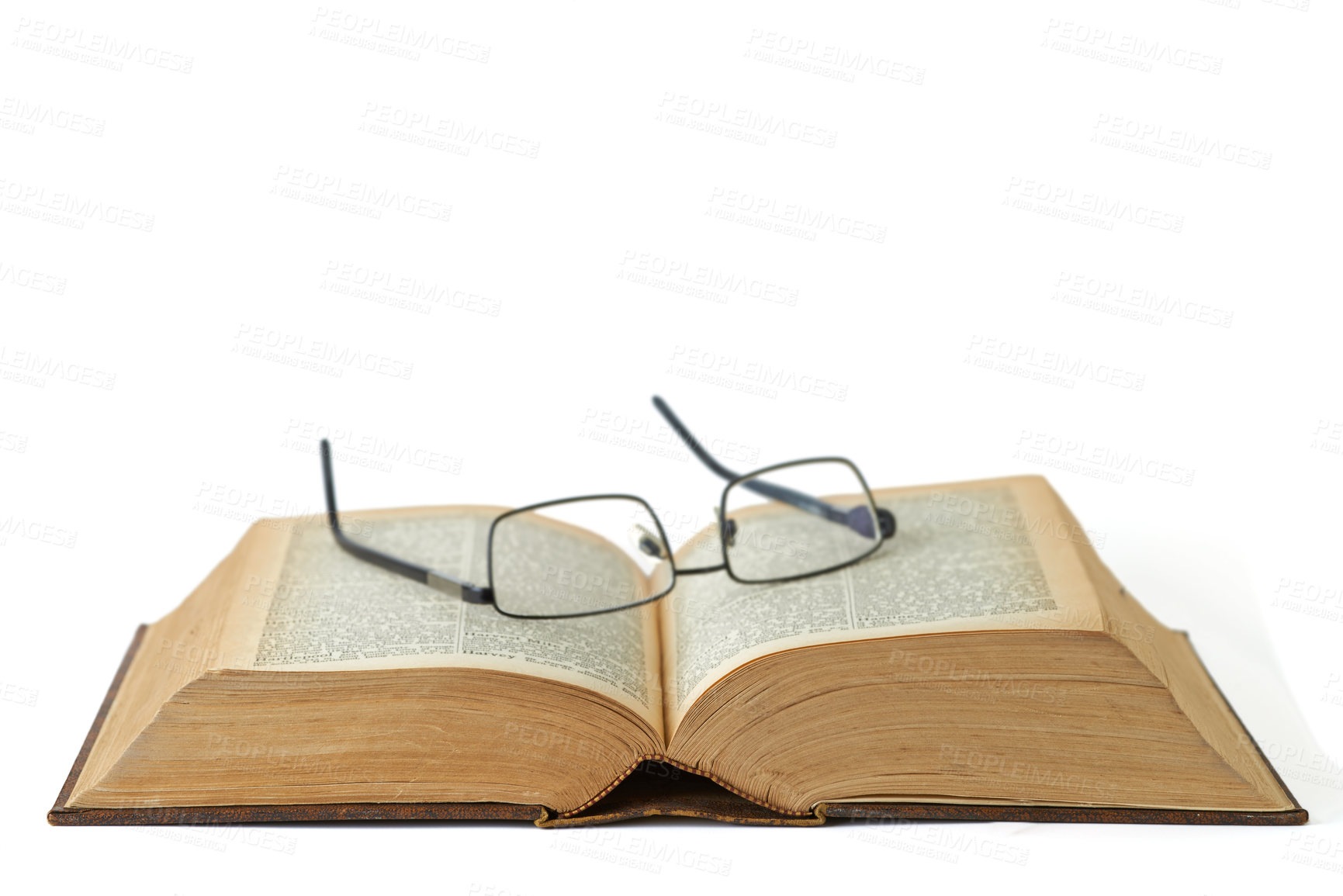 Buy stock photo Old, book or glasses with manuscript of knowledge, ancient literature or history on a white studio background. Closeup of historic novel or spectacles for vintage scripture or reading on mockup space