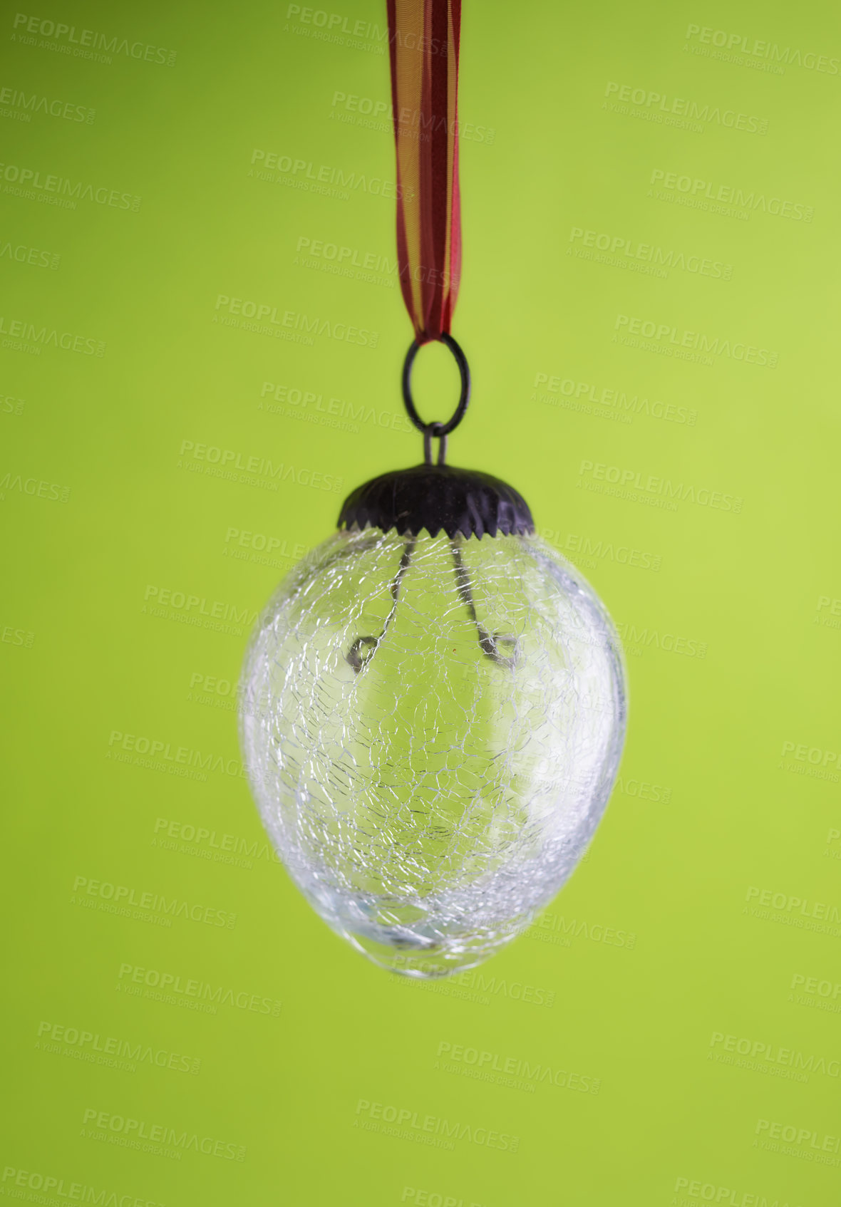 Buy stock photo Closeup of a glass lightbulb against a green copyspace background. Zoom in on lightbulb details with no electricity to power, energy crisis, turned off for load shedding, power outage or blackout