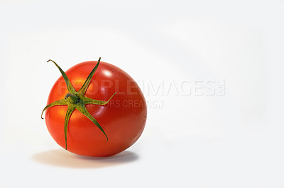 Buy stock photo An image of a tomato in a studio