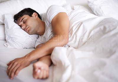 Buy stock photo Man, sleep and bed for peace, wellness and home for rest in pajamas and bedroom for relaxing and sleepwear. Male person, relax and dreaming at house, calm and tired after busy day and taking nap 