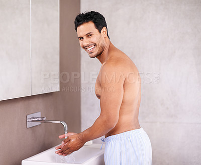 Buy stock photo Portrait, skincare and water with man in bathroom for washing hands, bacteria and facial hygiene. Healthy skin, dermatology and face of male person for grooming, wellness and morning routine.
